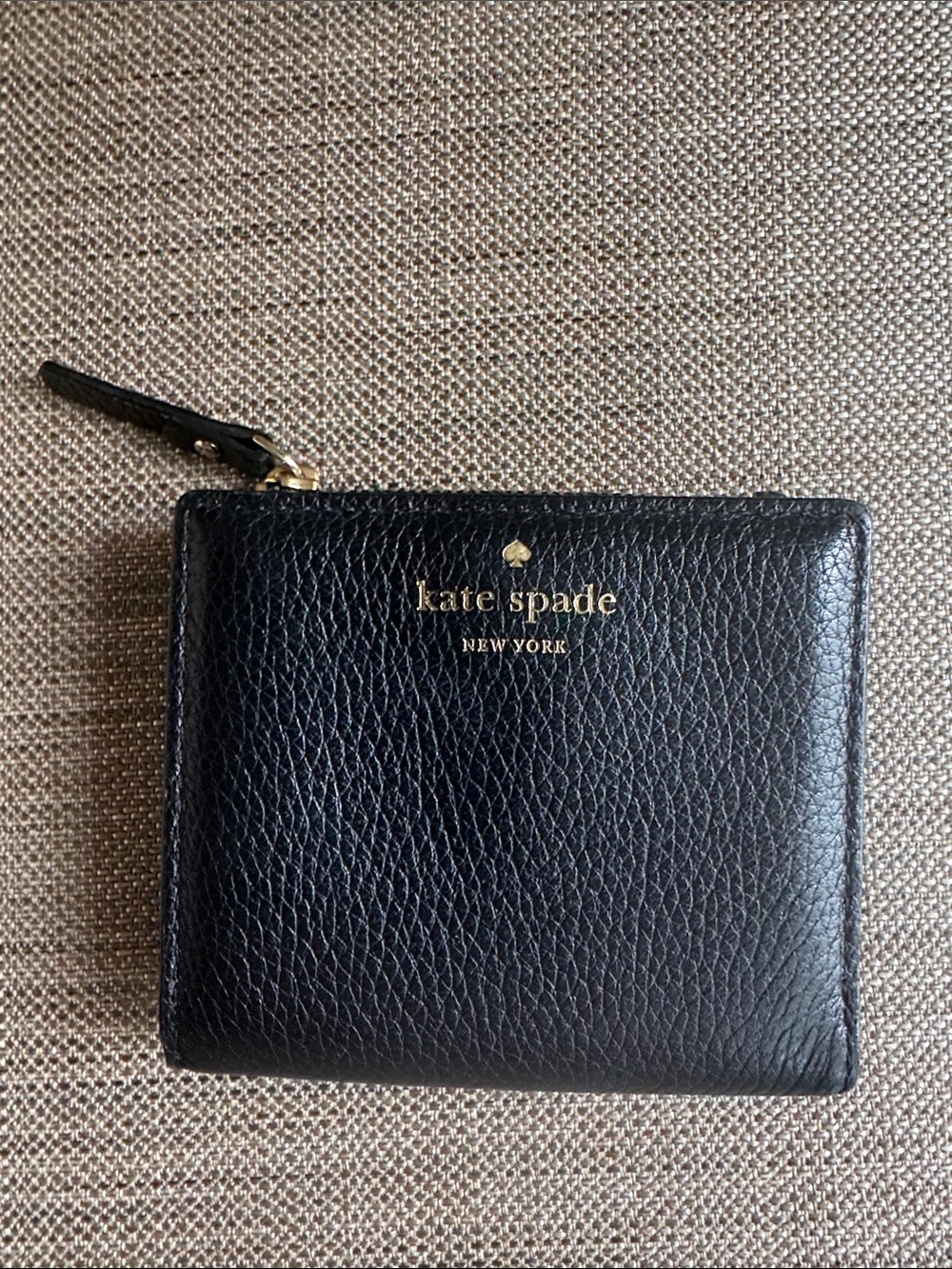 kate spade Black Pebbled Leather Bi-fold Wallet with Gold Logo